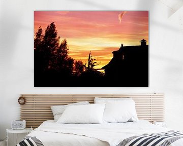 Droomhuis met een dromerige zonsondergang van Dexter Reijsmeijer