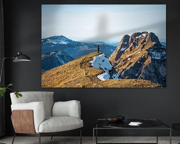 Hikers with a view of the Aggenstein in autumn by Leo Schindzielorz