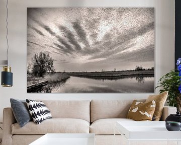 Spektakuläre Wolkenlandschaft mit Starenschwarm von Franke de Jong