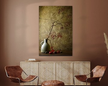 a vase with a beautiful autumn branch with berries by Ineke Huizing