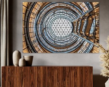 Looking up at the round shapes in a building's atrium by Bob Janssen