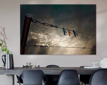 Pegs on the clothesline by Charles Verhoef