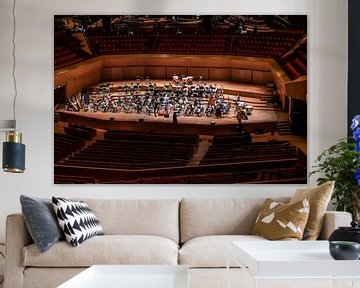 Rehearsal of an orchestra in a concert hall by Bob Janssen