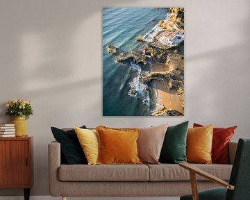 Washed-up waves along the Lagos coastline in Portugal's Algarve region by David Gorlitz