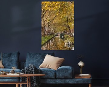 Autumn colours and a reflecting city canal in Enkhuizen in West Friesland by Harrie Muis