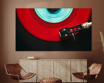 Red vinyl singe on record player by Frank Kremer