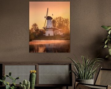 Holländische Windmühle am orangenen Morgen von Arda Acar