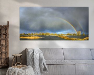 Regenbogen während eines herbstlichen Regenschauers über der IJssel von Sjoerd van der Wal Fotografie