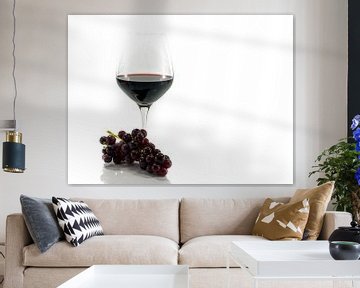 glas rode wijn met een tros druiven van ChrisWillemsen