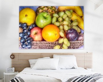 Fruit basket with various types of fruit by Egon Zitter