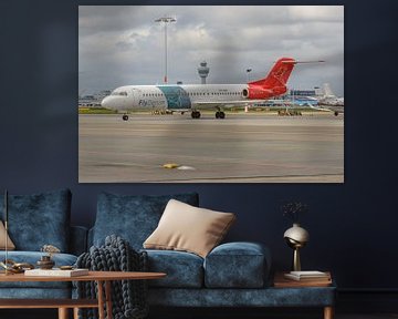 Denim Air Fokker 100 op Schiphol-Oost.