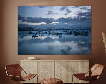 Iceland - Blue shining ice floes in glacier lagoon at midnight by adventure-photos