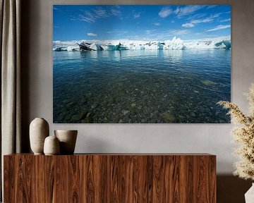 Iceland - Glacier lagoon with ice cold clear water and ice floes by adventure-photos