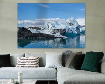 Iceland - Blue and black ice floes on glacier lagoon by adventure-photos