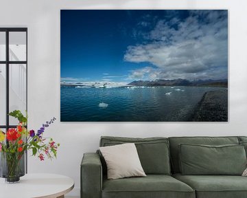 Iceland - Cloud front over glacial lake with black sand beach by adventure-photos