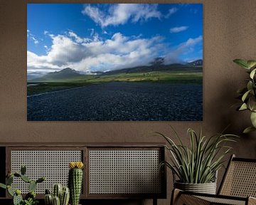 Iceland - Empty endless highway route 1 at shining green mountains by adventure-photos