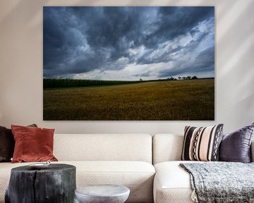 Thunderstorm with dramatic sky and cloud formations over harvest by adventure-photos