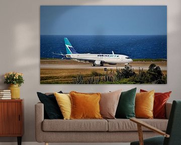 Vliegtuig van WestJet geland in Curaçao van Karel Frielink