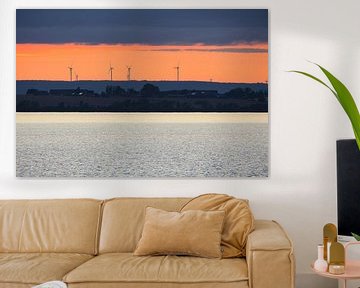 Wind turbines on an island at sunset by Martin Köbsch