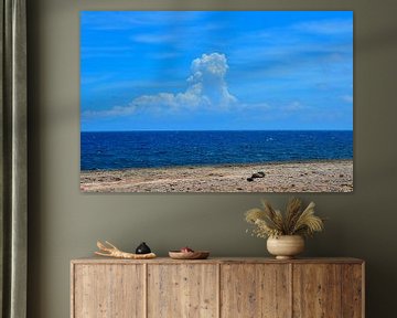 Clouds and sea at Playa Kanoa by Karel Frielink