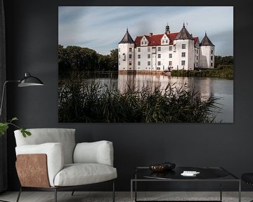 Glücksburg moated castle in the morning light with reflection