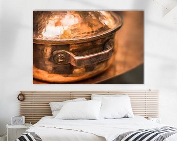 A beaten copper pan in Fez, Morocco by Tobias van Krieken