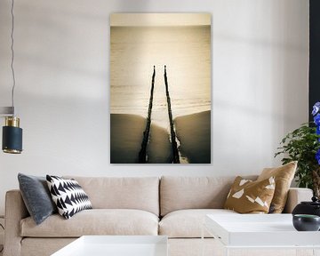 Blick von oben auf den Wellenbrecher am Strand von Domburg