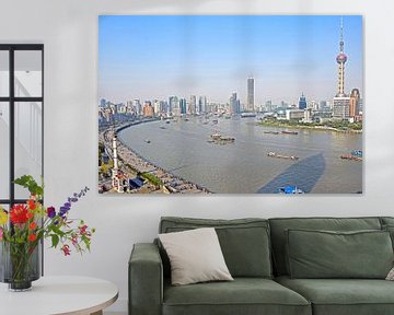 Blick auf Shanghai über den Huangpu-Fluss (The Bund) von Frans van Huizen