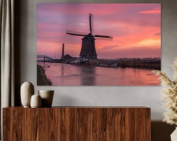 The Kaag mill in Spanbroek (North Holland) under a brightly coloured sky at sunrise. by Bram Lubbers