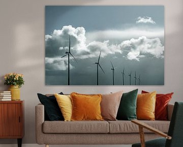 Wind turbines with a blue sky and clouds in the background by Sjoerd van der Wal Photography