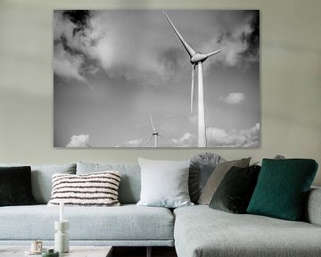 Wind turbines with a blue sky and clouds in the background by Sjoerd van der Wal Photography