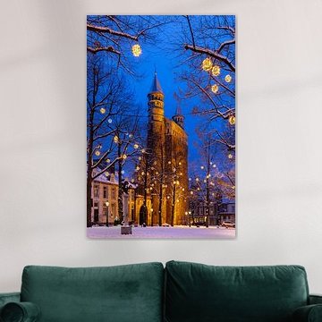 Our Lady Church in the blue hour with snow and Christmas lights by Kim Willems