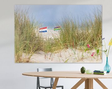 Flying flags in the dunes by Hilda Weges