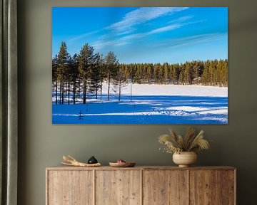 Landscape with snow and trees in winter in Kuusamo, Finland by Rico Ködder