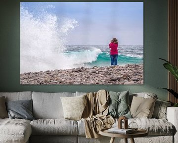 Young girl watching a stormy sea. by Carlos Charlez