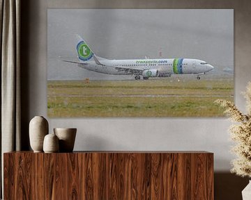 Transavia Boeing 737-800 im strömenden Regen. von Jaap van den Berg