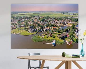 Luchtfoto van het dorp Langweer in Friesland Nederland bij zonsondergang van Eye on You