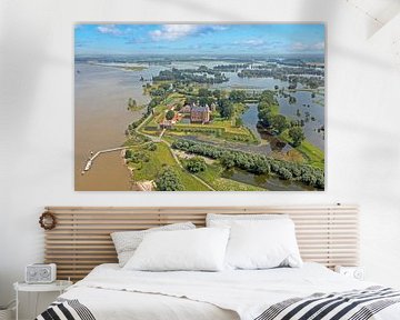 Aerial view of Slot Loevestein in a flooded landscape in the Netherlands by Eye on You