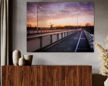 Sunset Symphony: The Wilhelmina Bridge and Bolwerksmolen in Deventer by Bart Ros