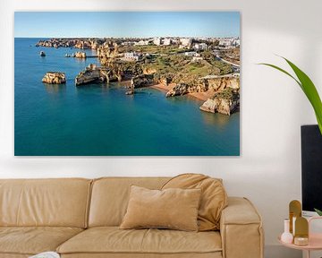 Aerial view of natural rocks near Lagos in Algarve Portugal by Eye on You
