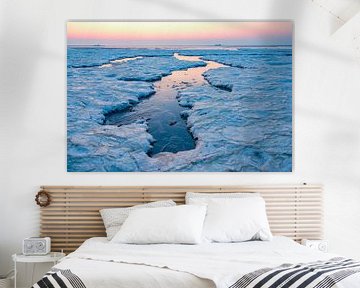 Ice and sea landscape on sand flats in the Waddensea