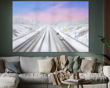 The A9 motorway in a winter snowstorm near Amsterdam Netherlands at sunset by Eye on You