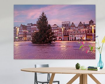 Kerstmis in Amsterdam op de Nieuwmarkt in Nederland bij zonsondergang van Eye on You
