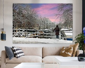 Snow-covered Amsterdam in winter in the Netherlands at sunset by Eye on You