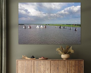 Aerial view of traditional skutsjesilen with old boats on Lake Heeger in Friesland in the Netherlands by Eye on You