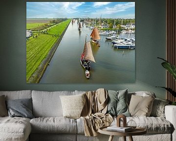 Luchtfoto van historische zeilschepen tijdens de  Workumer Strontrace in Workum in Friesland Nederland van Eye on You