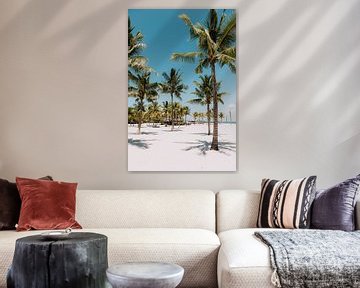 Tropical Paradise: Palm trees on a White Sandy Beach under Bright Blue Sky by Troy Wegman