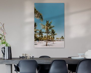 Tropical Paradise: Palm trees on a White Sandy Beach under Bright Blue Sky by Troy Wegman