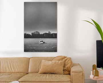 Open water swimmer in winter, black and white by Sander de Vries
