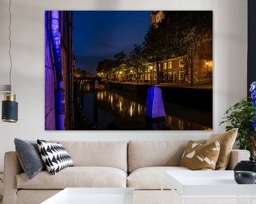 Illuminated canal in Dordrecht by Roel Jonker